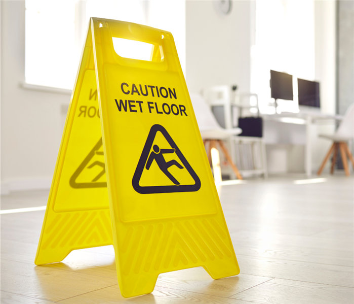 'caution wet floor' sign